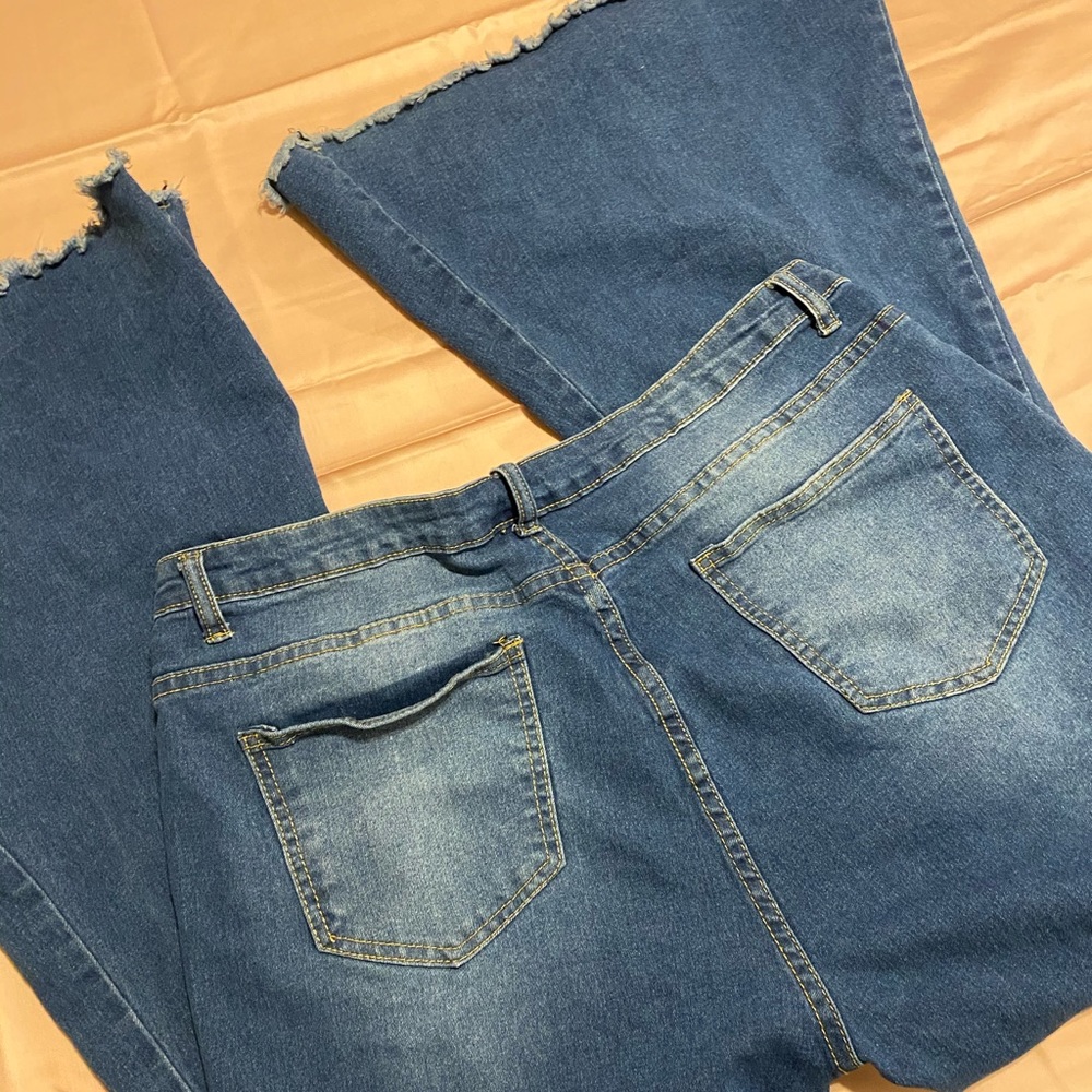 Distressed Bell Bottom Hippie Jeans